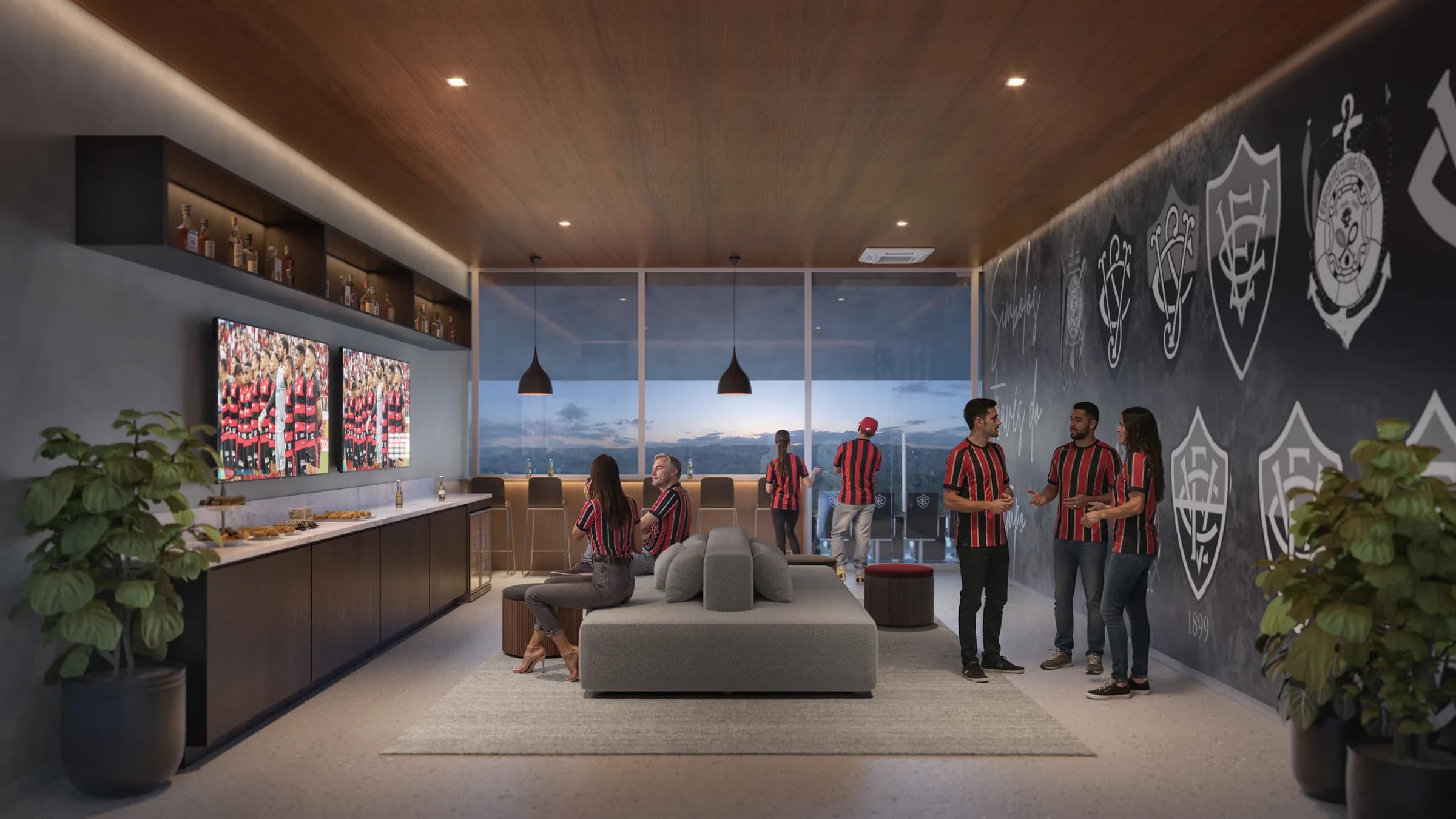 Interior de um camarote premium da Arena Barradão com parede dos escudos históricos do Vitória